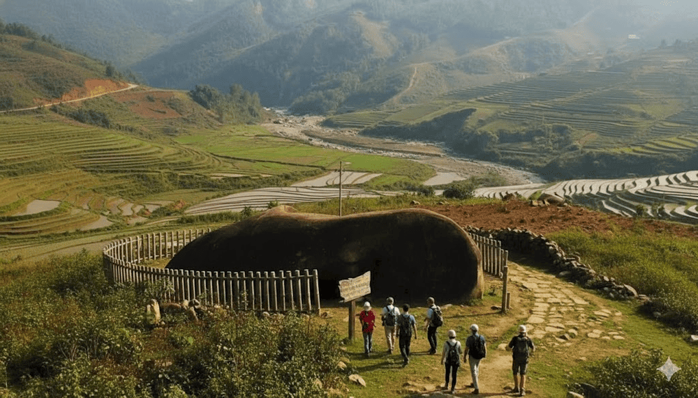 Muong Hoa Valley is a stunning landscape of terraced rice fields, winding streams, and ancient stone carvings
